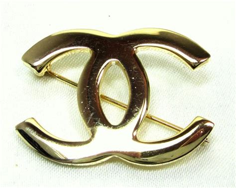 chanel cc reploca brooch|chanel brooches.